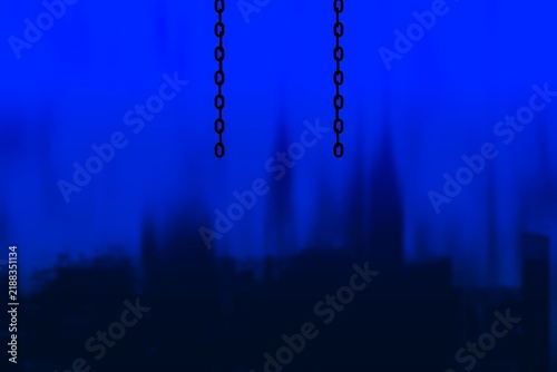 Foto chain link fence, with blur dark blue background