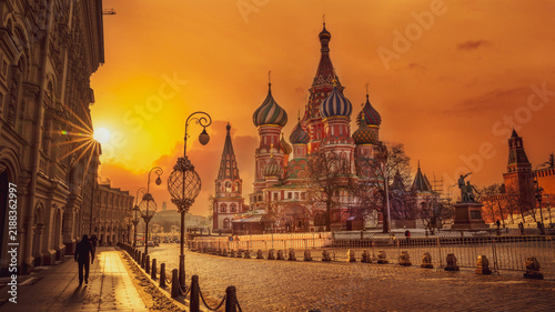 Photography Colorful onion domes glowing in golden city sunset