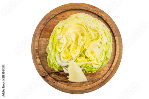 Quadro su tela Sliced iceberg lettuce cabbage isolated on white background