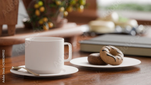 A white coffee cup sitting on a wooden table next to a small plate with two frosted donuts, featuring gentle steam rising in a warm, cozy indoor atmosphere