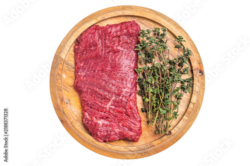 Quadro su tela Flank steak, raw beef meat with herbs for frying isolated on white background