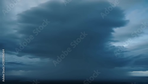 Massive dark shelf cloud stretching across distant horizon