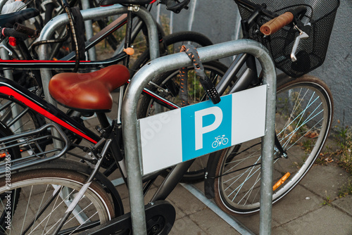 Obraz na plátne Bicycles are locked to a designated bike parking rack in Novi Sad Serbia