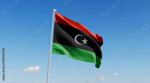 Fotografie Wavy Libya Flag and Clear Blue Sky