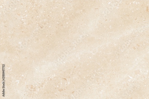 Beige limestone surface with fine fossil speckling and honed finish