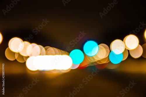 Bokeh lights blur at night with various colors