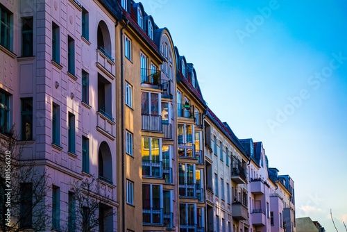 Apartment buildings with balconies and windows
