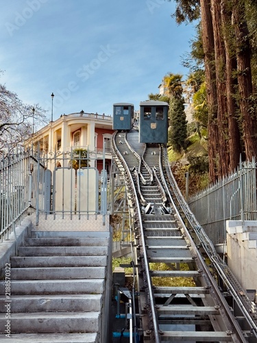 Quadro su tela Two Funicular Cars Passing Each Other on Steep Tracks in Pau, France