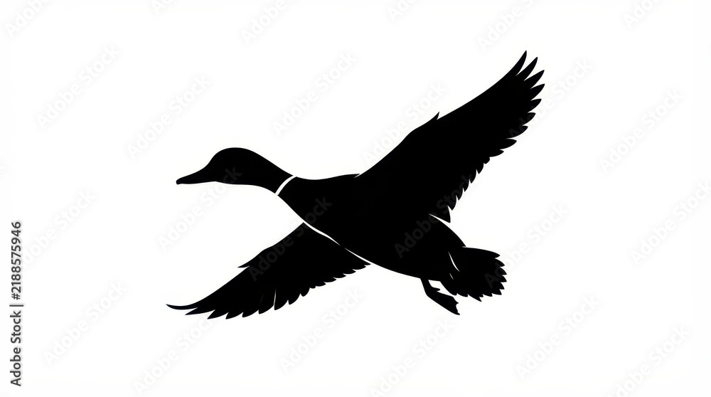 Obraz premium The Image Is A Black Silhouette Of A Duck In Flight The Duck Is In