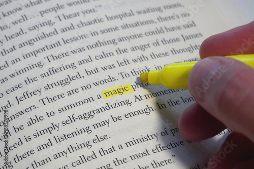 Magic word highlighted in a book page.