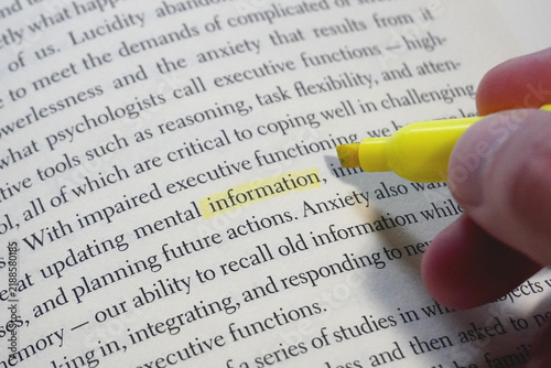 Information word highlighted in a book page.
