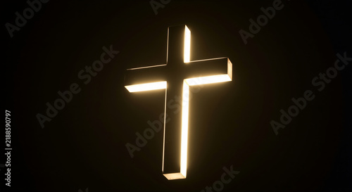 Christian cross glowing with bright back light against dark black background