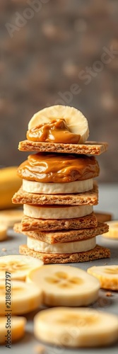 Stack of whole grain crackers with almond butter and banana slices, nutrition, function