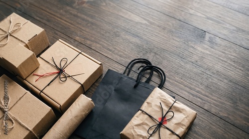 A large hairy tarantula spider crawls across a weathered wooden deck near several wrapped packages