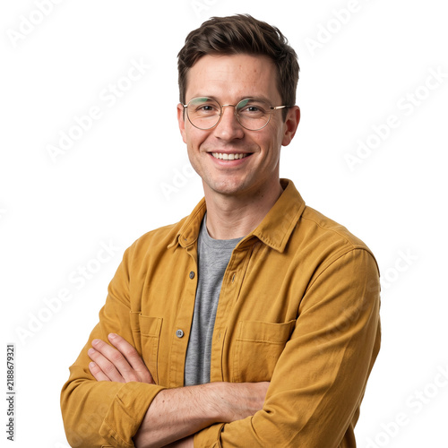 Smiling Man with Glasses Wearing Mustard Jacket Standing with Arms Crossed