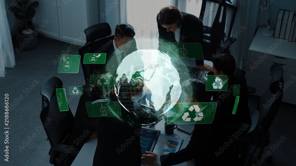 Obraz premium A dynamic business meeting in a modern office setting where professionals discuss sustainable development initiatives, featuring digital elements like a globe and eco-icons. Raster