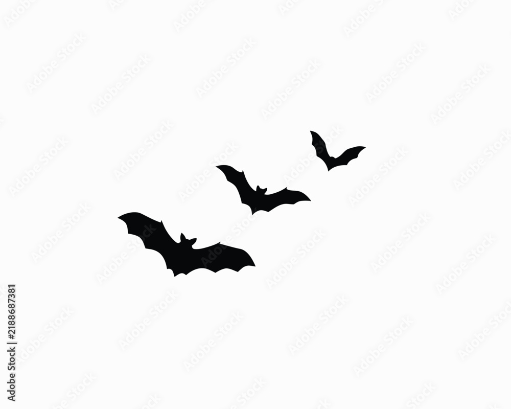 Fototapeta premium Three black bats flying in sky