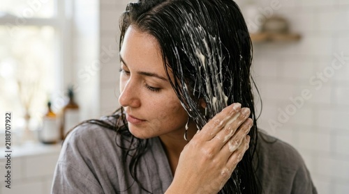 Woman applying hair mask, self care, beauty routine, healthy hair treatment