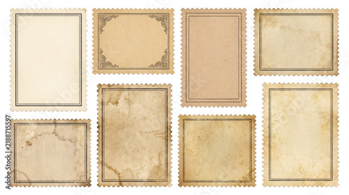 Blank vintage postage stamp collection features aged paper frames with decorative borders for nostalgic design projects