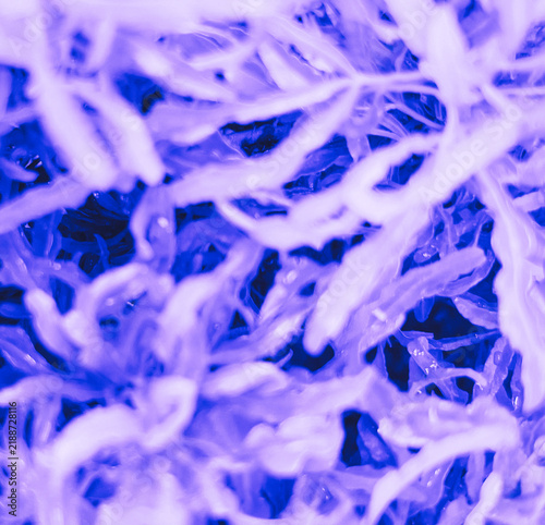 Yarn Texture, Abstract Close-Up, Vibrant Purple and Blue Tones, Knitted Fiber Art, Creative Background, Textile Design.