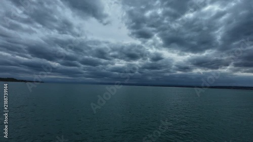 Ferry ride across Lake Constance between Konstanz and Meersburg, Germany, with views of open water, distant shoreline and surrounding landscape on an overcast day.