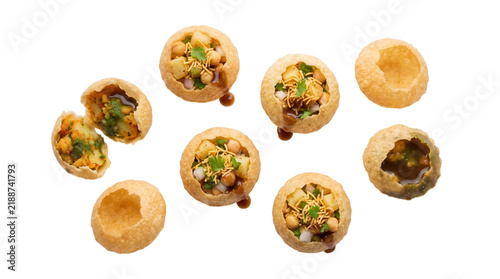 Top view of delicious indian street food pani puri or golgappa filled with spicy potato, chickpeas, chutney, and sev isolated on transparent background on transparent background