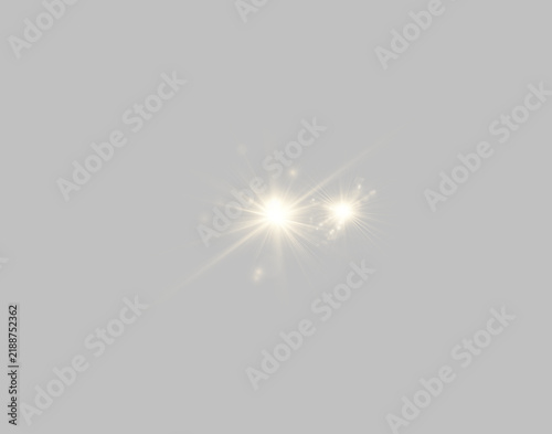 фотографія Two radiant golden light flares radiate outward with sharp, elongated rays