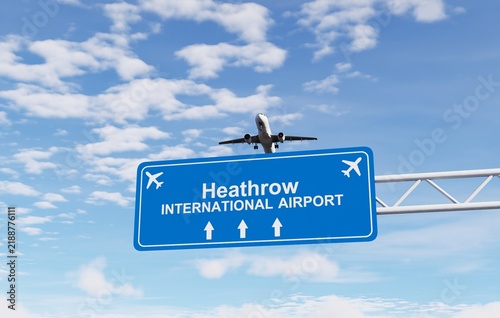 Heathrow Airport highway sign with a commercial passenger airplane flying above, representing air travel, airport access, transportation, tourism, and travel in London.