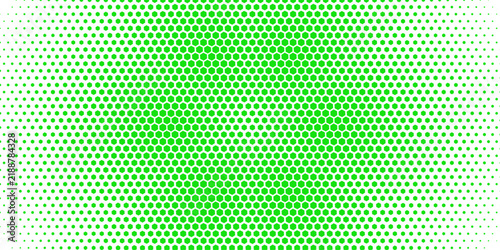Foto A vibrant background of green dots gradually fades to white, creating a gradient effect of abstract pattern
