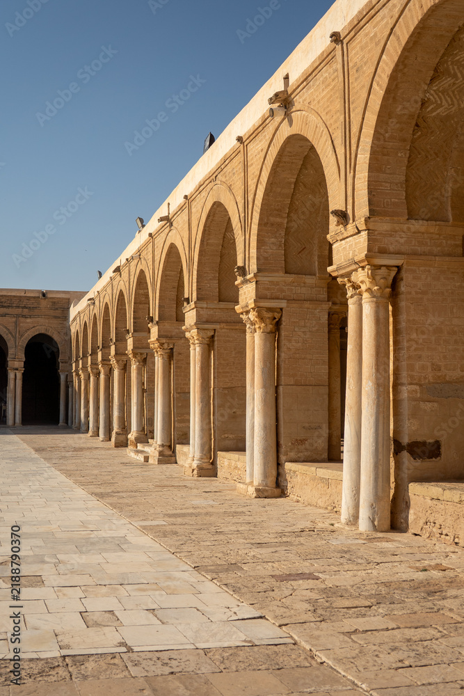 Fototapeta premium Repurposed Roman columns supporting the patio around the courtyard of the Great Mosque of Kairouan in the medina, in Kairouan, Tunisia