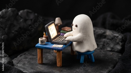 Cute Claymation Ghost Working on a Miniature Polymer Clay Laptop
