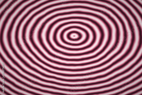 Obraz na płótnie Maroon and pink concentric waves form soft feminine circular pattern for creativ