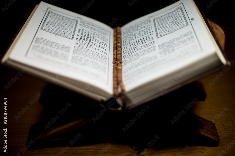 Fototapeta premium pages of holy koran and rosary at the book