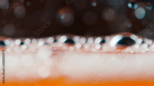 Macro Detail of Orange Spritz Glass with Condensation Droplets
