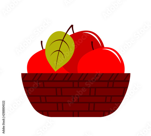 apples in wicker bowl isolated on white background
