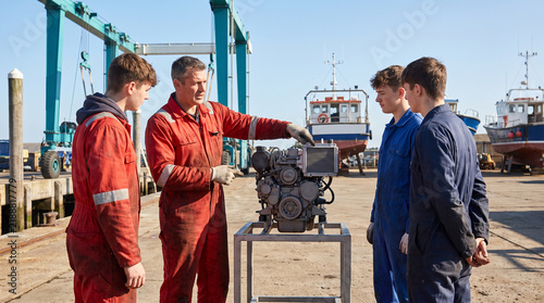 Marine mechanic opens a harbor engine service course