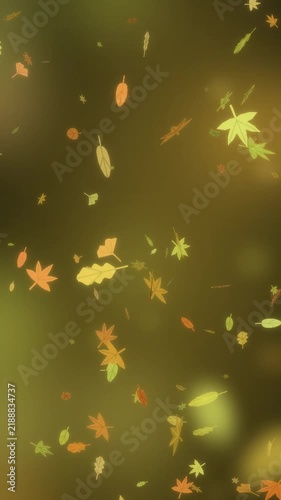 Autumn Leaves Tumbling Down Over Warm Golden Bokeh Seamless Loop in vibrant olive tones vertical 9:16