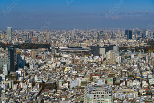 Expansive Tokyo cityscape featuring Japan National Stadium and surrounding Meiji Jingu Gaien area