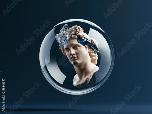 Statue head inside a clear bubble with a blue cloth on top