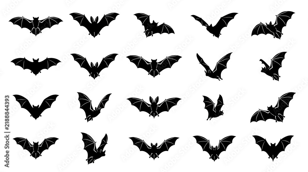 Fototapeta premium Set of black bat silhouettes in various flight poses for Halloween design.