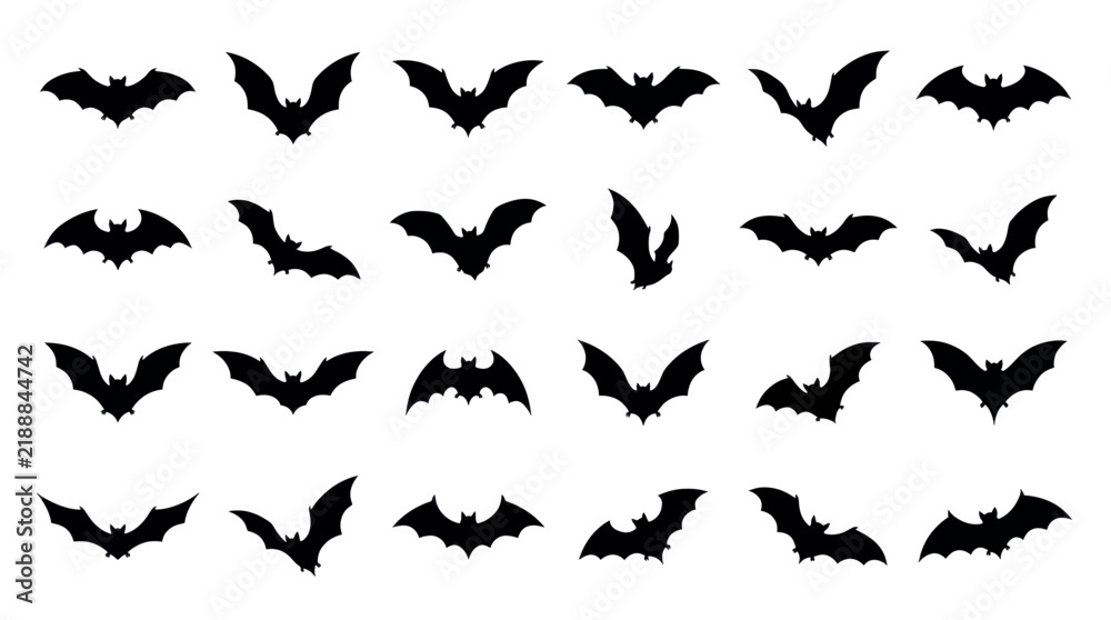 Fototapeta premium Set of various black bat silhouettes flying in different positions isolated on a white background.
