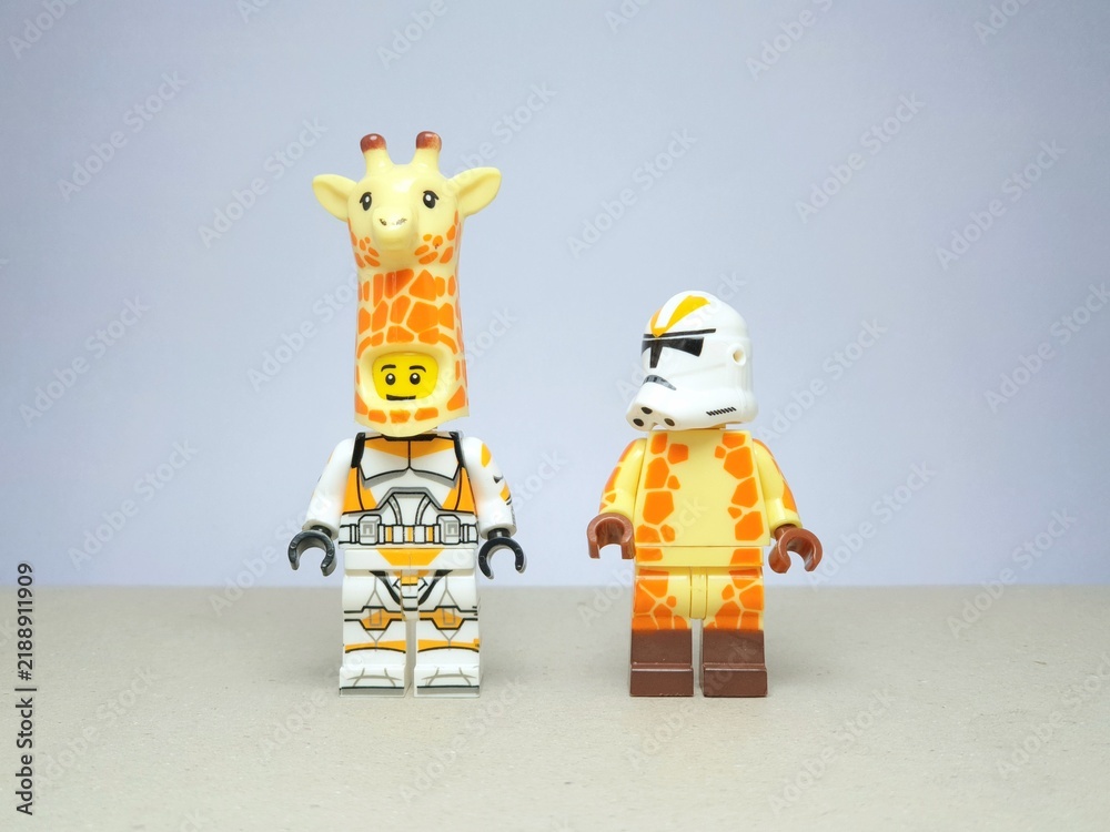 Fototapeta premium Indonesia - November 24, 2023 : Mini toy figure of lego at table with blurred background. Miniature photography concept design.