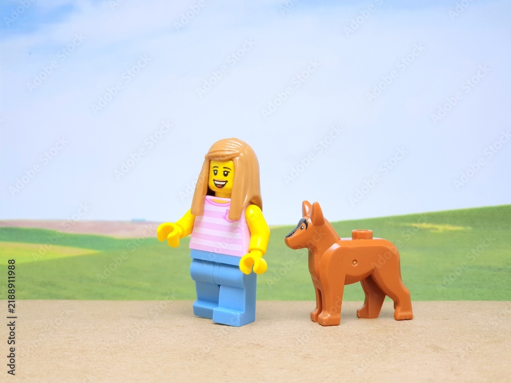 Fototapeta premium Indonesia - November 24, 2023 : Mini toy figure of lego at table with blurred background. Toy photography concept design.