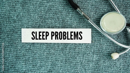 Foto Stethoscope and paper with the word Sleep problems