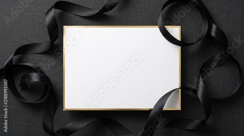 Blank White Card with Gold Foil Trim Surrounded by Black Ribbon Curls