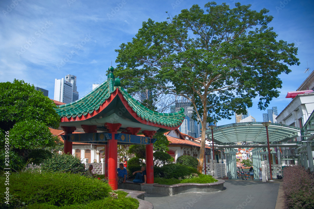 Fototapeta premium Traditional Chinese Pavilion in Chinatown, Singapore with City Skyline