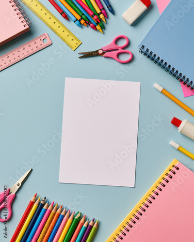 School supplies blank paper colorful pencil notebook scissor ruler eraser glue back to school stationery education learning study classroom flat lay top view pastel color art material drawing