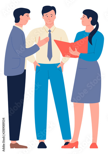 Colleagues discussing work. Team talking together with office documents