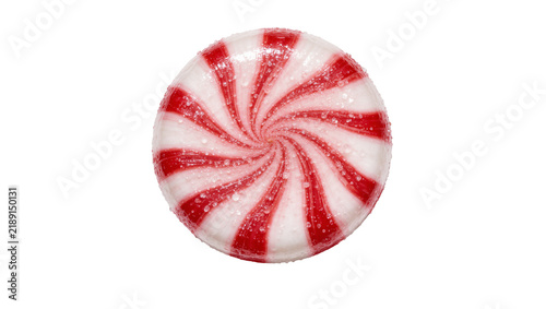 Round red and white swirled peppermint candy with sugar crystals, isolated on transparent background