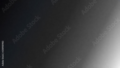 Abstract smooth gradient background with soft transition from deep black to bright white light
